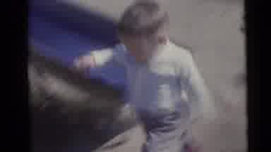 Camden New Jersey USA (1960): Two Little Kids Run Around Playground Together As
