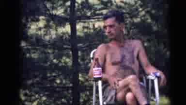 Camden New Jersey USA (1960): Man Sits Next To Empty Black White And Yellow Lawn