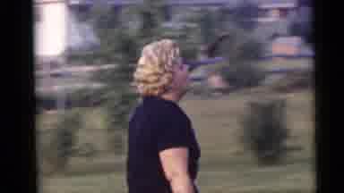 Camden New Jersey USA (1960): Woman In Plaid Pants And Black Tee Shirt Walking