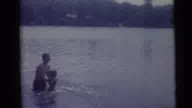 Camden New Jersey USA (1960): A Person Is Playing With His Child Lifted From The