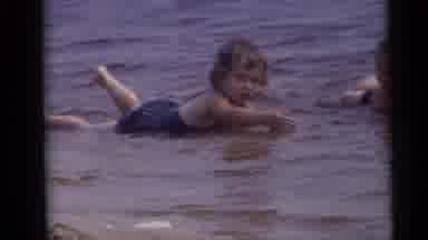 Camden New Jersey USA (1960): Three Children Enjoy Swimming At The Beach Wearing