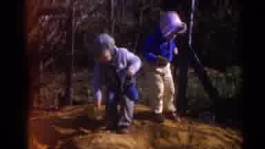 Camden New Jersey USA (1960): One Child Digging Atop Dirt Pile With Toy Shovel And