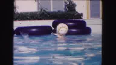 Miami Florida USA (1960): Two Young Girls With White Caps Swim In Pool With Black