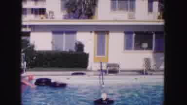 Miami Florida USA (1960): Swimming Pool Next To Home Cuts To Two Women Playing In