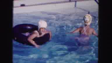 Miami Florida USA (1960): Two Girls Swimming In A Pool And Another Three Girls