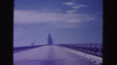 Miami Florida USA (1960): Riding Down A Long One Lane Road During A Clear Day