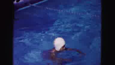Miami Florida USA (1960): Person Wearing White Swim Cap Holds Nose Before