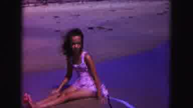 Miami Florida USA (1960): Daughter Plays In The Tide While Sitting Near Sister And