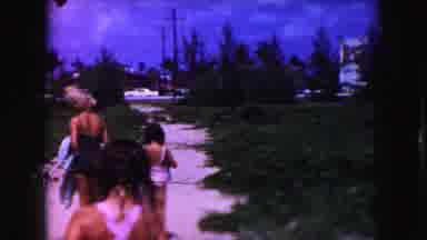 Miami Florida USA (1960): Woman Leaving The Beach With Children After Having Fun
