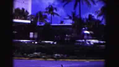 Miami Florida USA (1960): Sunny Day Cars In A Parking Lot Of A Couple Of Building