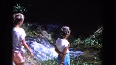 Miami Florida USA (1960): Friends Play In The Park Where There Is A Very Long