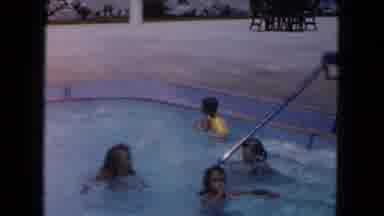 Miami Florida USA (1960): A Group Of People At A Shallow Pool That Consists Mostly