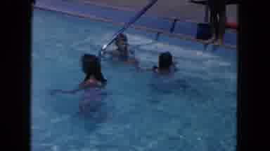 Miami Florida USA (1960): Man Wearing White Shorts Walks Away From Pool On A