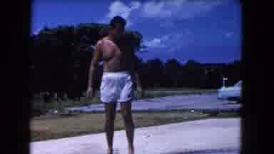 Miami Florida USA (1960): Man Casually Walking Up To A Diving Board In Swimming