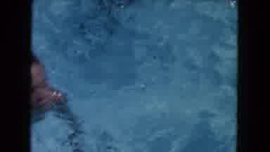 Miami Florida USA (1960): Kids Splashing Around In A Swimming Pool While A Woman