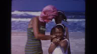Miami Florida USA (1960): Girls Wearing White Swimwear Run From Surf Water On A