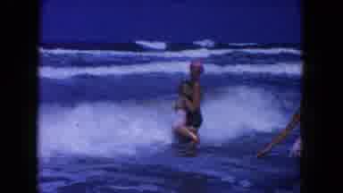 Miami Florida USA (1960): Mother And Daughter Playing In Waves Together At Beach