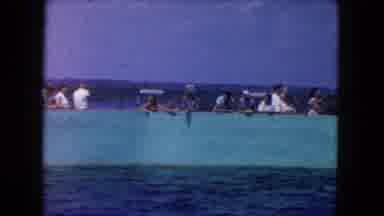 Miami Florida USA (1960): A Group Of People Stand Near The Edge Of A Wall