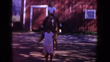 Miami Florida USA (1960): A Girl Is Sitting On A Horse And Another Girl Is Holding