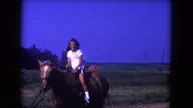 Miami Florida USA (1960): A Girl Riding A Horse And Another Girl Is Holding A