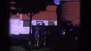 Miami Florida USA (1960): Two Figures Walk Toward A Saddled Brown Horse