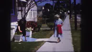 Tampa Florida USA (1960): Two Women Walk Up Onto Porch Of Suburban House And One