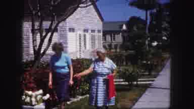 Tampa Florida USA (1960): The Two Persons Are Talking And Discussing Some And See