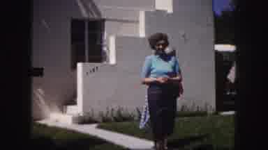 Tampa Florida USA (1960): Two Older Women Going Inside Of A Home On The Concrete