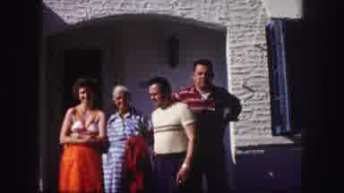 Tampa Florida USA (1960): Man And Elderly Woman Sit By Tree Then Pose For Group