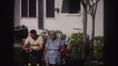 Tampa Florida USA (1960): Man And Woman Sitting Together Outside On Sunny Day
