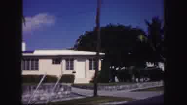Tampa Florida USA (1960): Older Lady Sitting Outside Of Her Home And A Scene Of