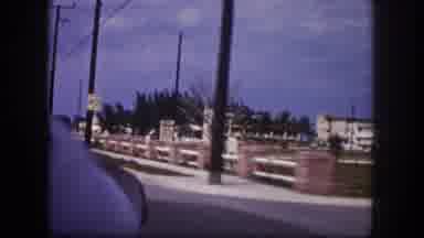 Tampa Florida USA (1960): Driving Past Couple Of Large White Building Surrounded