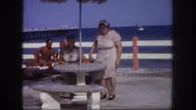 Tampa Florida USA (1960): Two Older White Ladies Sit Below A Covered Table By A
