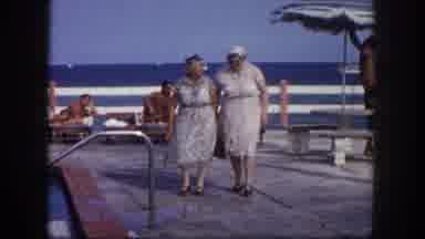 Tampa Florida USA (1960): The Two Persons Are Walking In The Waterside