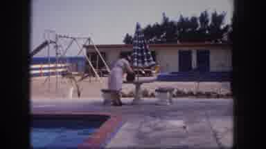 Tampa Florida USA (1960): An Elderly Woman Picking Up Her Bag And Walking To A