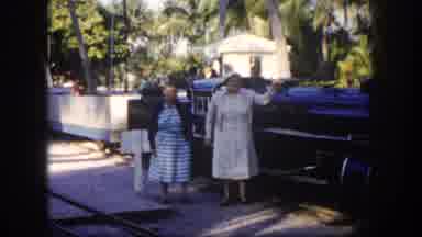Tampa Florida USA (1960): Two Ladies In Dresses Posing In Front Of A Train