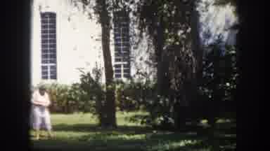 Tampa Florida USA (1960): Two Elderly Woman Walking On Grass In Front Of White