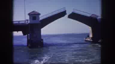 Tampa Florida USA (1960): A Lifting Bridge Raised And A Shot Of A Speed Boat