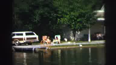 Lynbrook New York (1976): Panning Footage Lake House Car Lawn People Reclining On