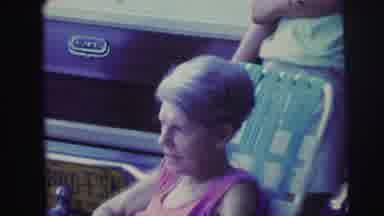 Lynbrook New York (1976): Two People Ride In Rowboat On Lake On A Clear Day