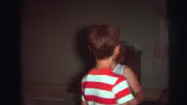 Lynbrook New York (1976): Girl Wearing White Gown Turns Away From Camera To Get