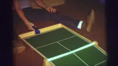 Lynbrook New York (1976): A Person Is Playing With White Ball On A Green Board