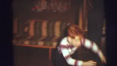 Lynbrook New York (1976): One Boy Playing And Another Guy Playing With A Toy