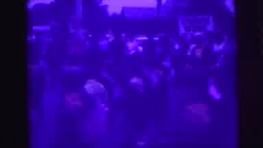 Lynbrook New York (1976): A Crowd Of People Are Marching While Holding American