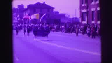 Lynbrook New York (1976): Two Girls Hold Parade Banner In Front Of Marching Band