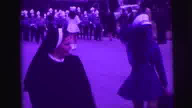Lynbrook New York (1976): Nuns March Down A Street With A School Band In A Parade