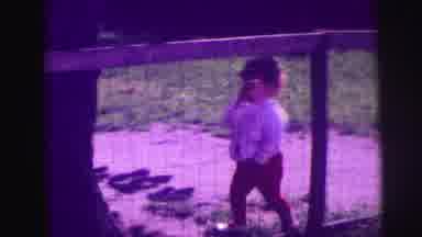 Lynbrook New York (1976): Two Small Children Walking Around Outside And Leaning On