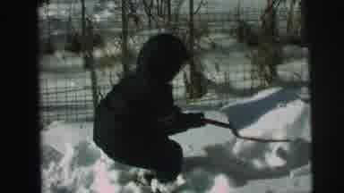 Lynbrook New York (1976): Two Kids Playing In The Snow With Shovels