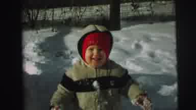 Lynbrook New York (1976): A Child Stands On Ice Particles And Then Knocks On The