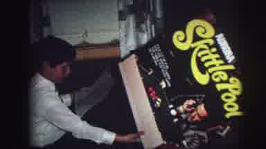 Lynbrook New York (1976): A Child Opening A Skittle Pool Box And A Baby Playing In